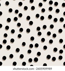 Regularly spaced black dots stand out on a light-coloured background