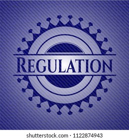 Regulation badge with denim background