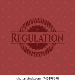 Regulation badge with red background
