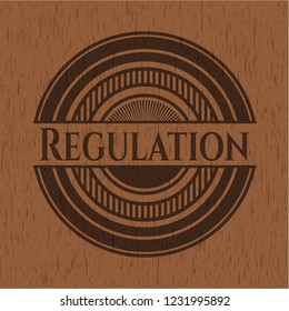 Regulation badge with wooden background