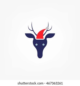 Reindeer child in Christmas red hat.