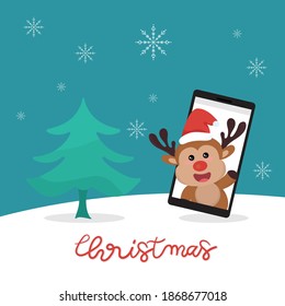 Reindeer coming out of the mobile phone in winter clothes with snow background.