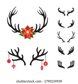 Reindeer horns with poinsetia flower and happy holiday lettering . Vector 