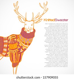 Reindeer in knitted sweater