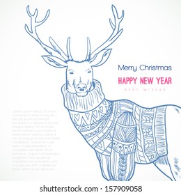 Reindeer in knitted sweater
