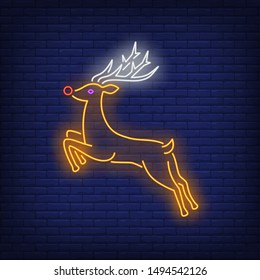 Reindeer running neon sign. Christmas and New Year Day design. Night bright neon sign, colorful billboard, light banner. Vector illustration in neon style.