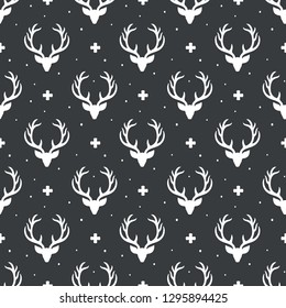 Reindeer seamless pattern background, deer head silhouette with antlers, modern scandinavian background, nordic style