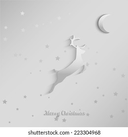 Reindeer slides on silvering background at night under the moon