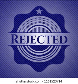 Rejected badge with denim background