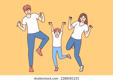 Rejoicing dad, mom and little boy dance and celebrate victory young family competition or winning lottery. Positive family dancing energetically at disco enjoying cheerful atmosphere and good music 
