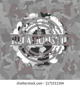 Relationship written on a grey camouflage texture