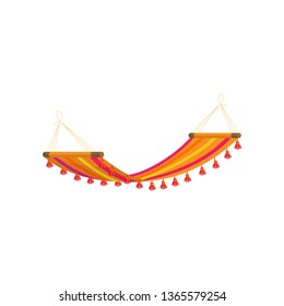 Relax colorful red yellow textile hammock on beach