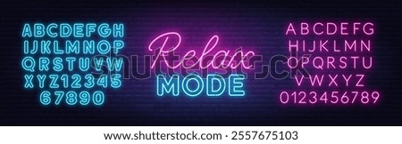 Relax Mode Neon text on brick wall background.
