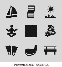Relaxation icons set. set of 9 relaxation filled icons such as spa stones, carpet, bench, golf stick, man laying in sun, flippers, sailboat, yoga
