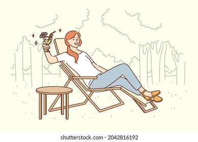 Relaxation and leisure activity concept. Smiling pretty woman cartoon character sitting in deck chair drinking fancy cocktail relaxing alone outdoors vector illustration 