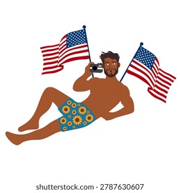 relaxed american man lying down holding camera and flags