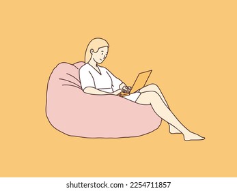 Relaxed woman with laptop sitting on bean bag simple korean style illustration