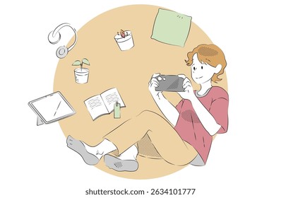 Relaxing boy playing smartphone at home with cozy items