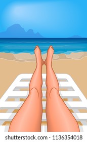 Relaxing legs on a sunbed with a view of the ocean in the distance