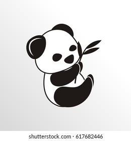 relaxing panda with bamboo leaf in his hand