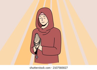 Religion and spiritual believe concept. Young smiling woman nun with eyes closed in hood standing with hands crossed and praying in ray of light vector illustration 