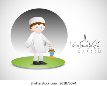 Religious cute boy holding arabic lantern on green stage for holy month of Muslim community Ramadan Kareem.
