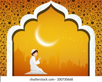 Religious Muslim boy praying with crescent moon for holy month of Muslim community Ramadan Kareem. 