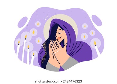 Religious woman reads prayer standing near church altar with candles, asking god to have mercy on soul of deceased. Believing girl visits christian temple and says prayer before confession.