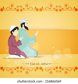Religious young Muslim man with his son praying (Namaz, Islamic Prayer) on floral design decorated yellow background for Muslim community festival Eid-Ul-Adha celebrations. 