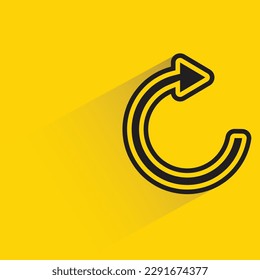 reload arrow with shadow on yellow background
