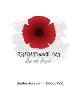 Remembrance Day November 11 typography with poppy flower - international symbol of peace, text is Lest we forget for Memorial Day Armistice Day anniversary celebration in British Commonwealth