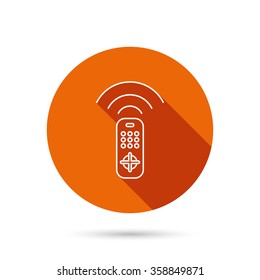 Remote control icon. TV switching channels sign. Round orange web button with shadow.