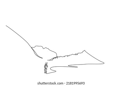 remote view of a person walking on the mountain road in nature