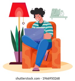 remote work. the man in the chair is working on a laptop.