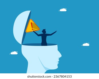 Remove suffering from your brain. Businessman throws away warning sign from head