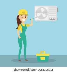 Repair of air conditioner. Woman with work tools fixing and repairig.