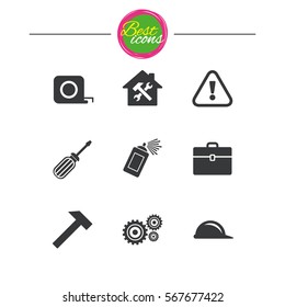 Repair, construction icons. Helmet, screwdriver and hammer signs. Gears, painting spray and attention symbols. Classic simple flat icons. Vector