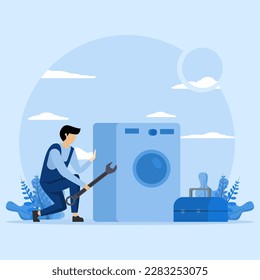 Repair Service Concept. Repairman in uniform repairing electric washing machine with tools. Professional worker with wrench. The host repairs broken household appliances. Electrician, call a plumber.