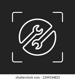 Repair service. Linear, thin outline. White object in camera autofocus on dark background
