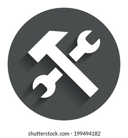 Repair tool sign icon. Service symbol. Hammer with wrench. Circle flat button with shadow. Modern UI website navigation. Vector
