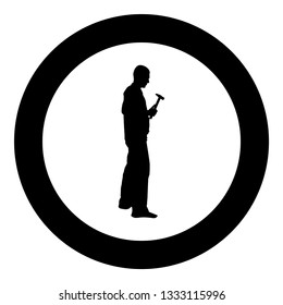 Repairman master man in overalls with tool in his hands hammer icon black color vector in circle round illustration flat style simple image