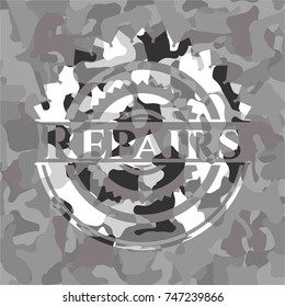 Repairs on grey camo texture