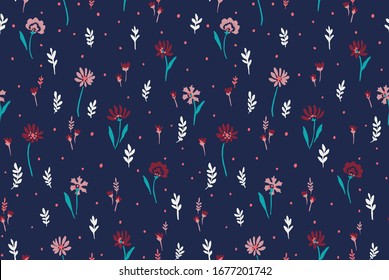 Repeatable floral pattern consisting of colorful flowers on blue background.