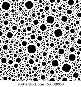 Repeatable geometric pattern with scattered, random shapes