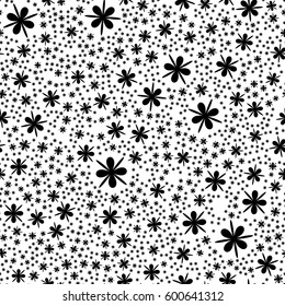 Repeatable geometric pattern with scattered, random shapes