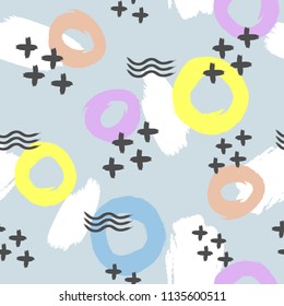 Repeated brushstrokes and geometric shapes drawn by hand. Stylish seamless pattern. Grunge, sketch, watercolour. Trend vector illustration. Blue, white, black, yellow, brown, purple.