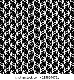 Repeated decorative design with broken lines, hatching and marks. Pattern in black and white.