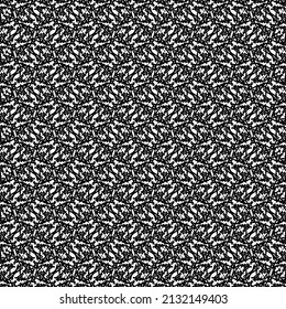 Repeated decorative design made from an arrangement of small irregular shapes and a kind of hatching with dots and dashes. Abstract tapestry texture. Pattern in black and white.