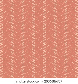 Repeated decorative design with stripes and plaits. Cotton towel in reddish tones. Sweater texture.