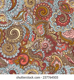 Repeated decorative pattern with traditional indian ornamental design - scroll, paisley, feather